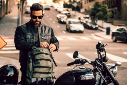 OGIO ALPHA Convoy 525 Backpack with man on Motorcycle